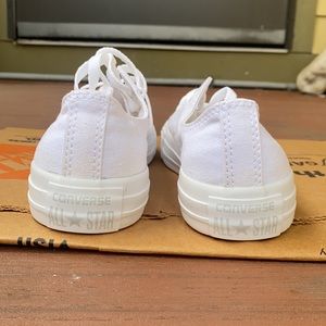 white mens converse sneakers size 5. Never worn.